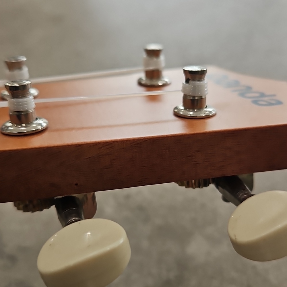 Natural Wood Ukulele with Light Brown Neck - Picture 7 of 14